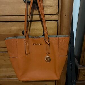 Michael Kors, used good condition,orange tote